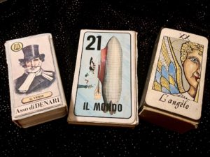 Three vintage Italian Tarot decks.