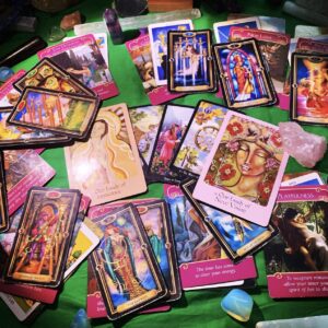 Variety of Tarot and Oracle Cards on a table